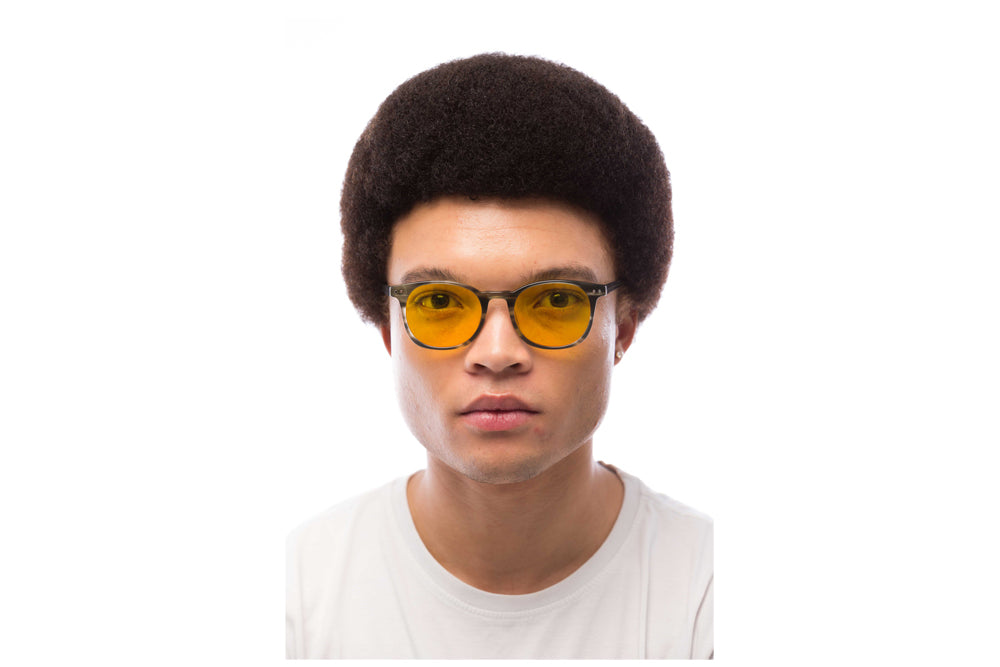 Man Wearing Arrow Light Sensitivity Glasses