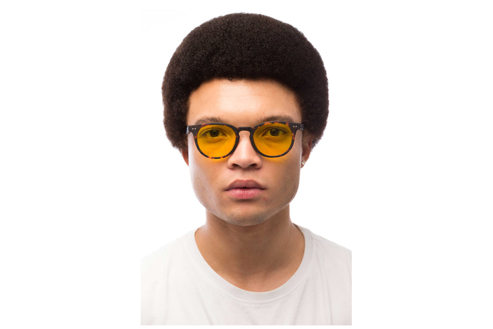 Man Wearing Clarke Light Sensitivity Glasses