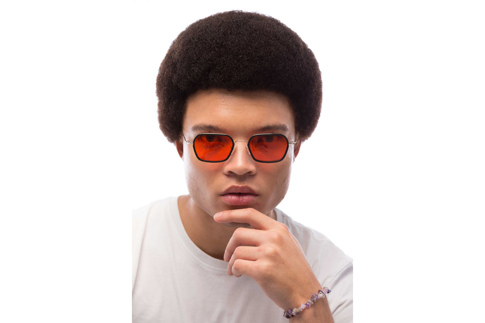 Man Wearing Mac Blue Light Blocking Glasses