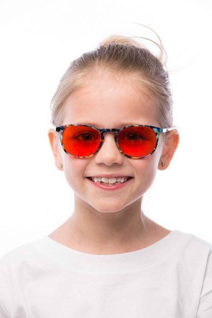 Girl Wearing Elsa Blue Light Blocking Glasses