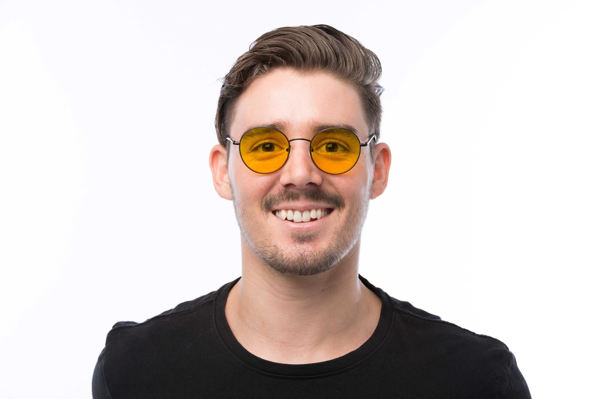 Man Wearing Lennon Light Sensitivity Glasses