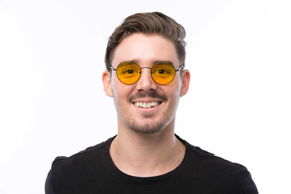 Man Wearing Lennon Light Sensitivity Glasses